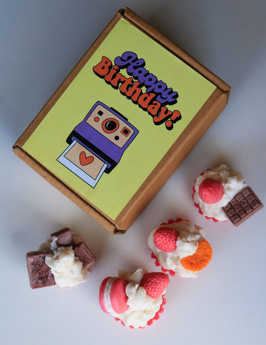 Set of four cupcake candles, birthday box